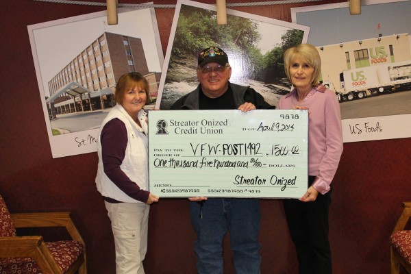 Linda and Mary Kay present a check to VFW Post #1492