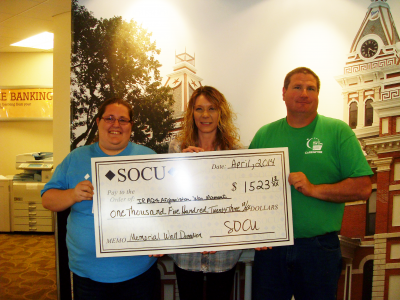 SOCU presents a check for the Iraq/Afghanistan War Monument.